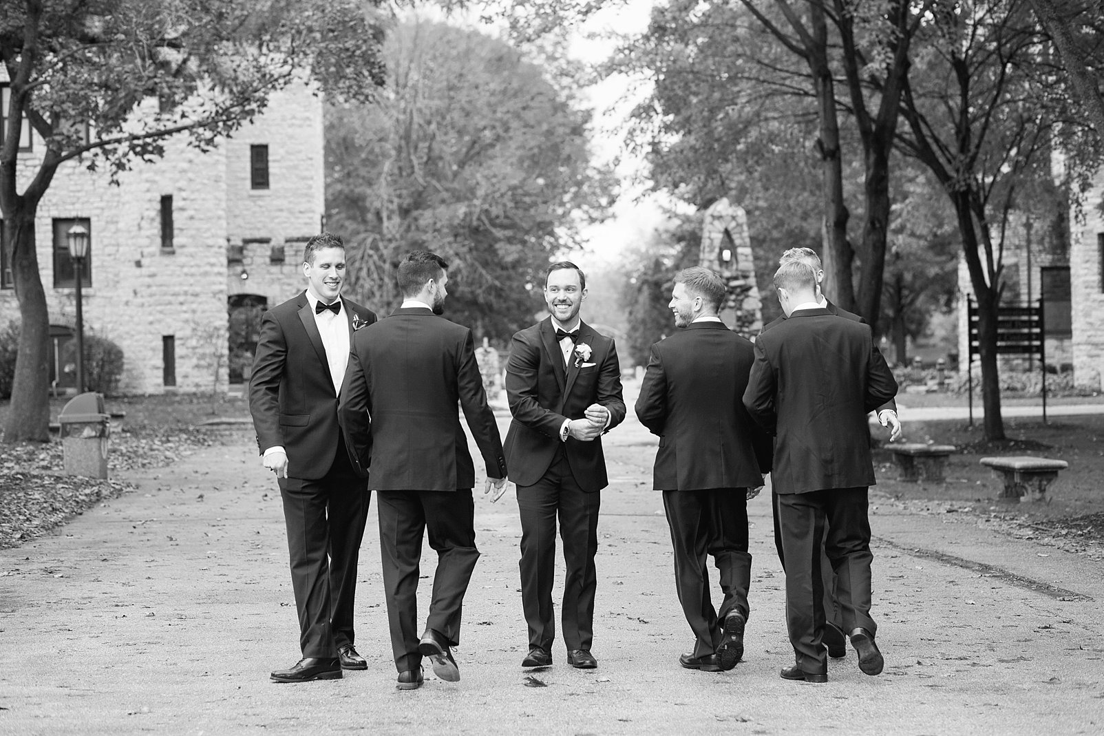 black and white photo of groom and groomsmen