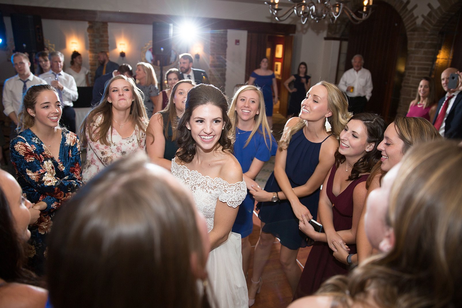 bride dancing with her friends