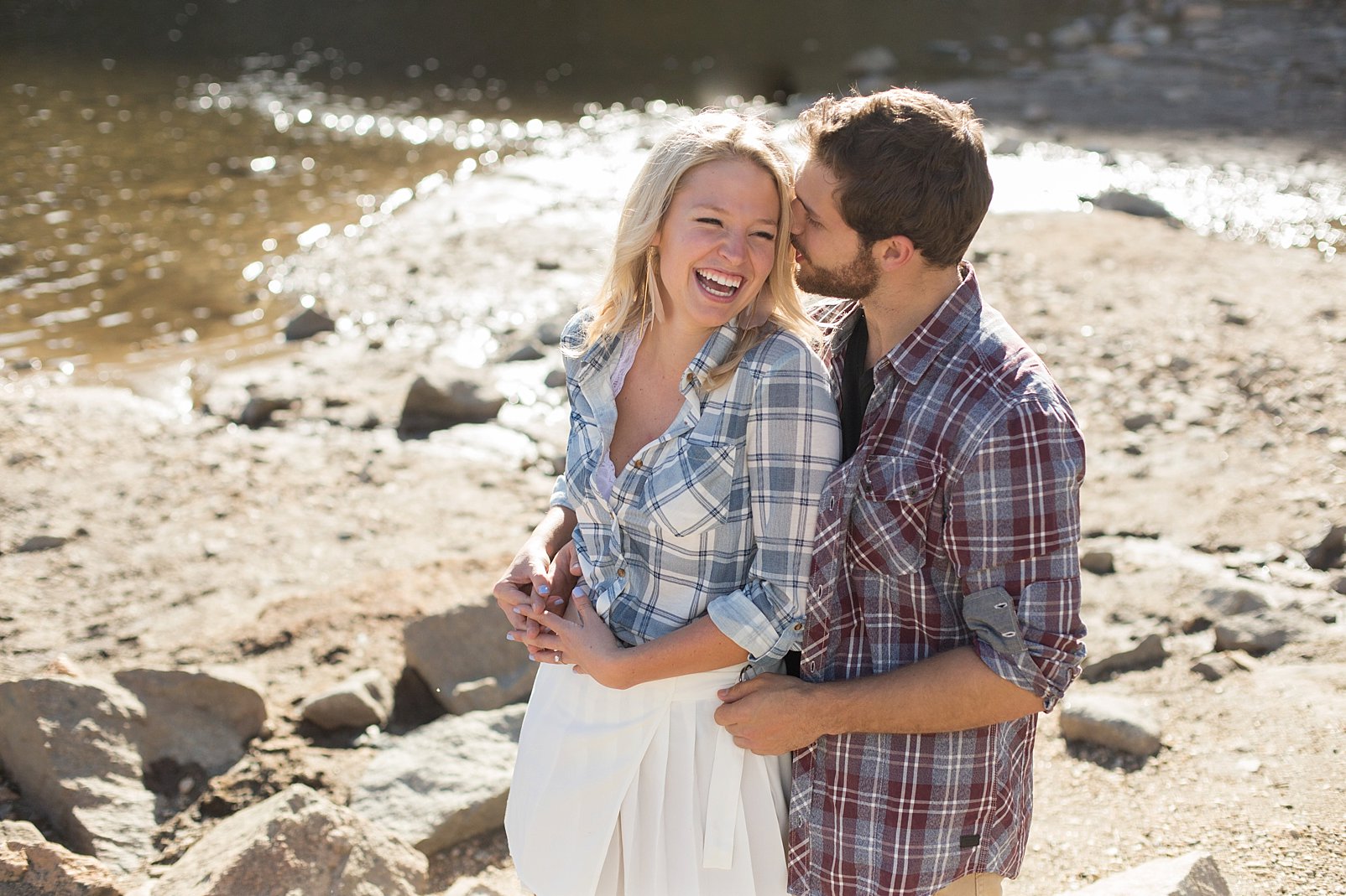 laughing during colorado engagement session