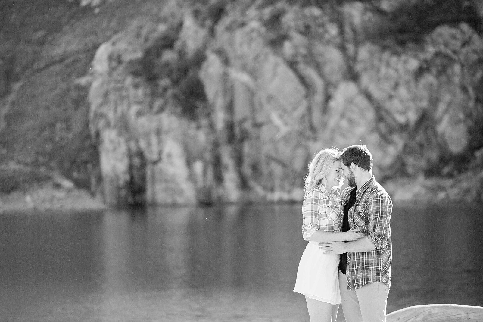 black and white engagement photo in colorado mountains