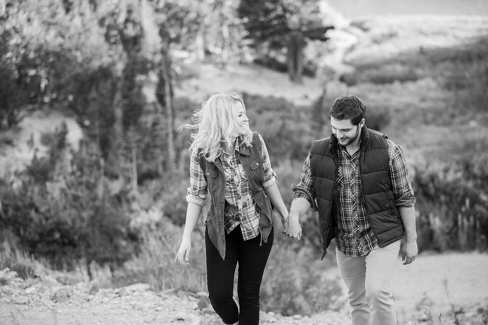hiking up a mountain during colorado engagement session