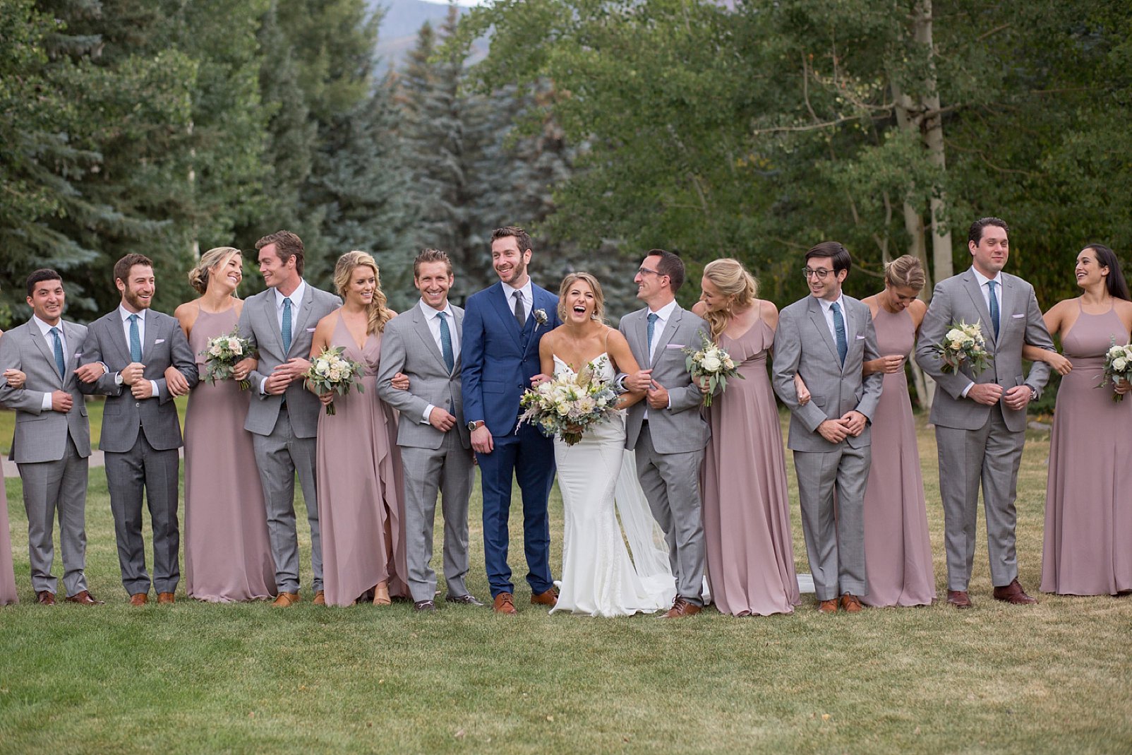 bridal party photo on larkspur vail lawn