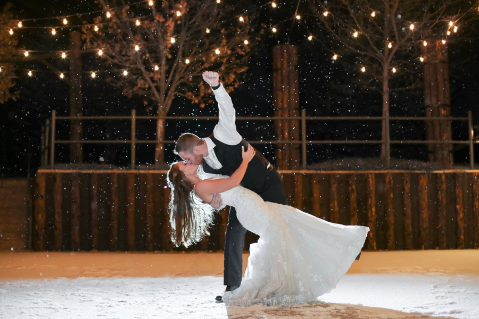 night photo with snow during colorado winter wedding at spruce mountain ranch