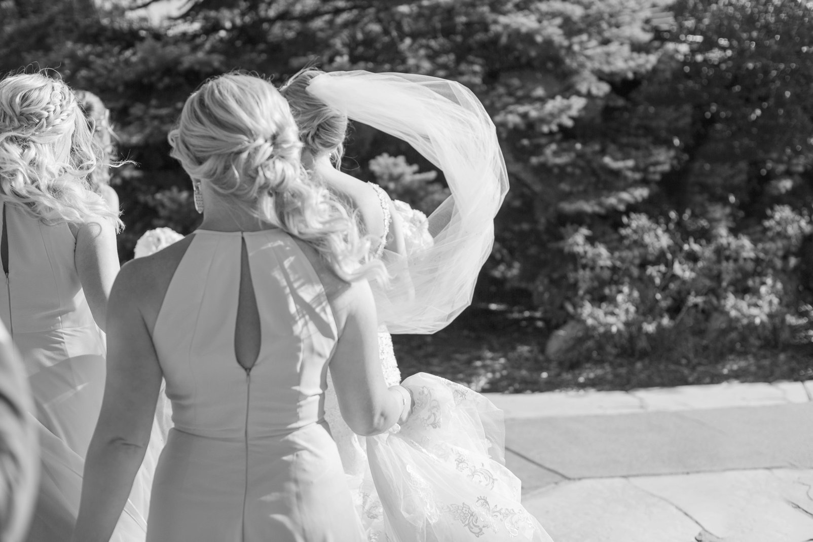 black and white photo of bride during wedding at the sanctuary
