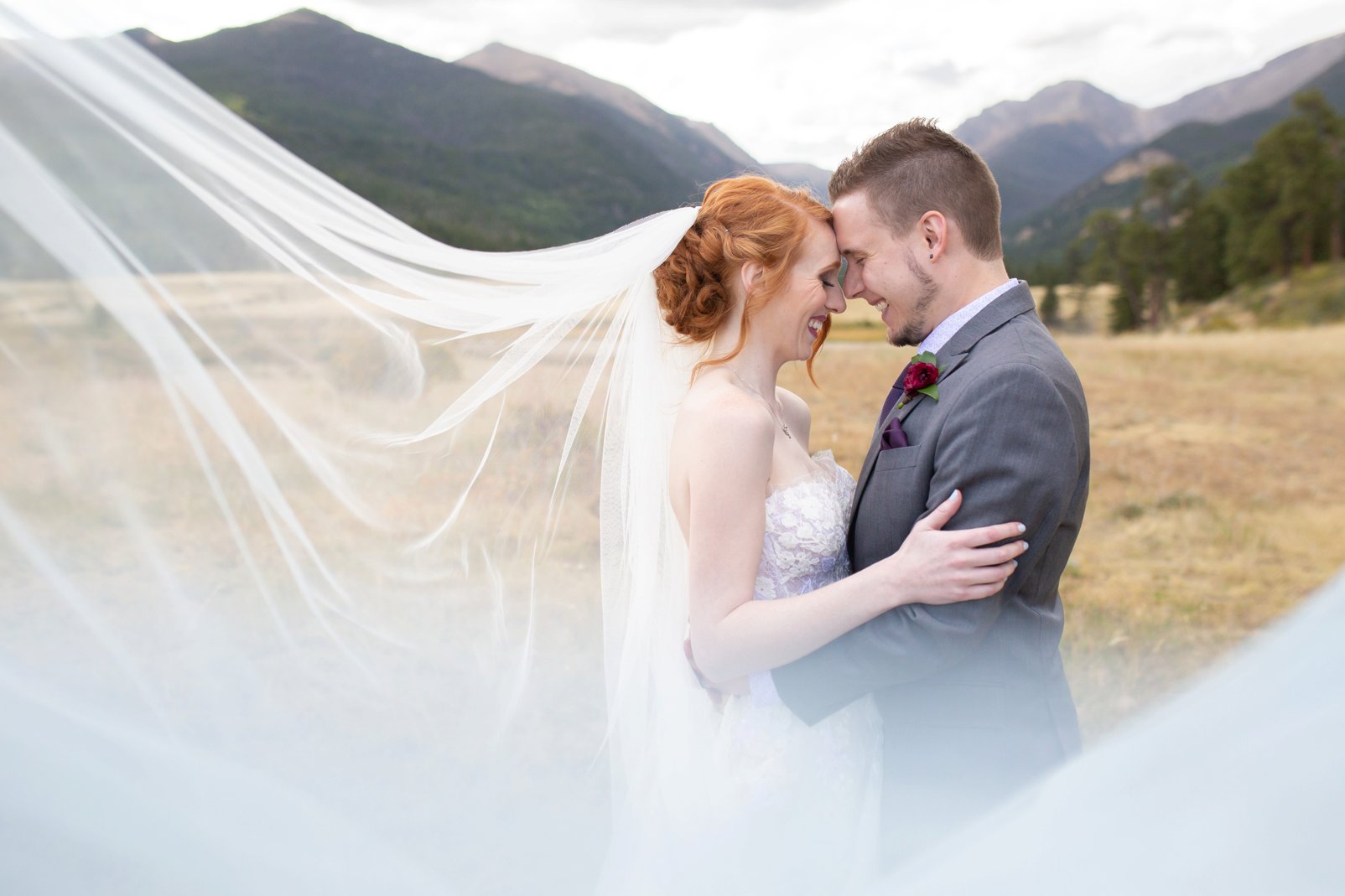 bride & groom veil photo during colorado mountain wedding